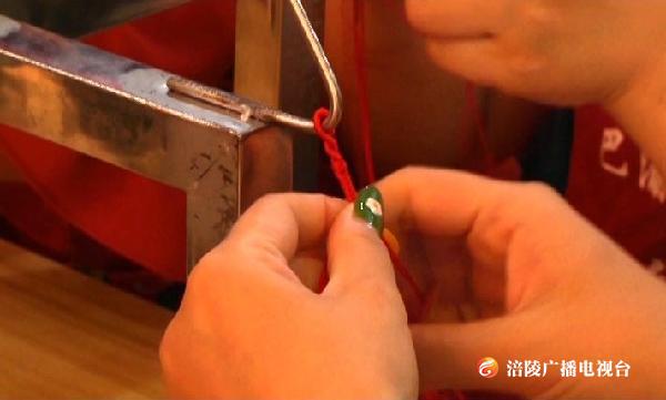 小小结绳编织起希望